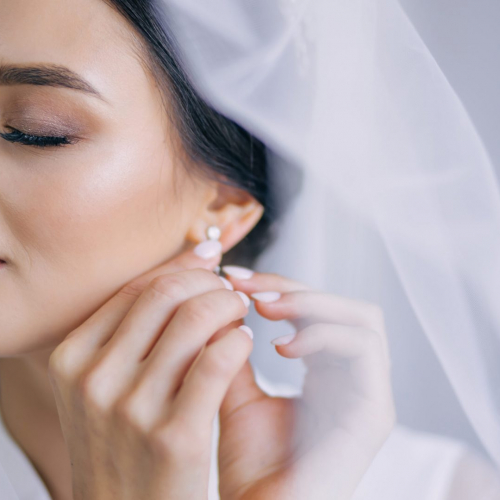 A,Beautiful,Bride,In,A,White,Robe,With,A,Veil